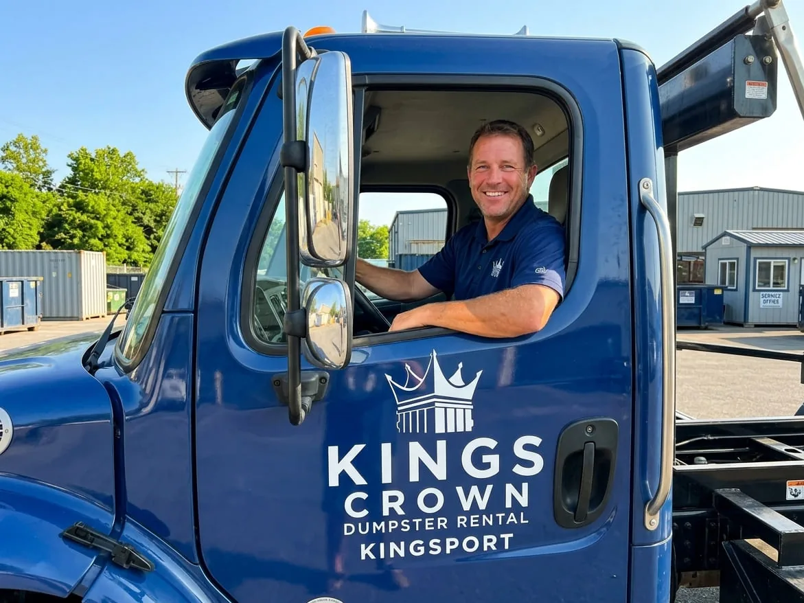 The Kings Crown Dumpster Rental team beside a roll-off truck and container in Kingsport, TN